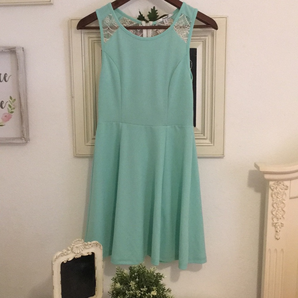 Teal lace dress.